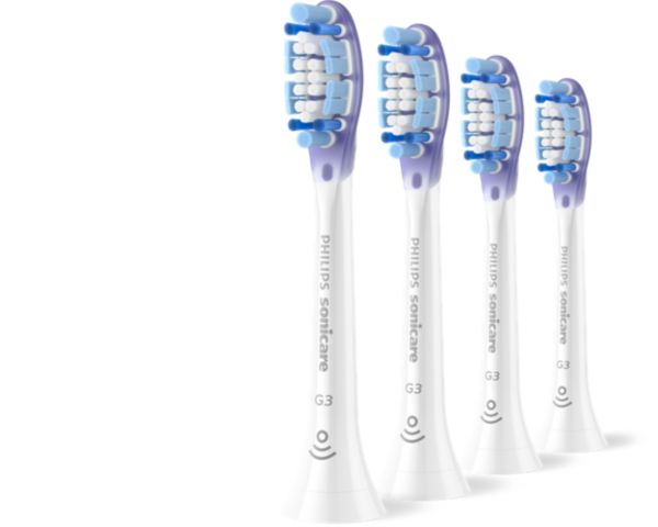 Three Philips Sonicare Premium Gum Care brush heads