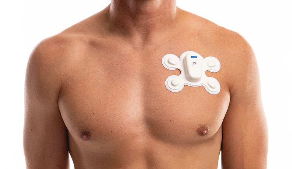 Philips’ LifeSignals partnership combine UbiqVue® multiparameter biosensor with Philips monitoring ecosystem infrastructure, man wearing biosensor