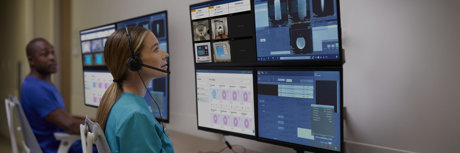 Imaging expert looking at several screens that show Philips Radiology Operations Command Center