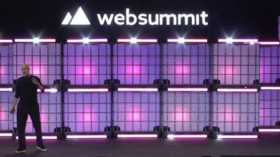 Peter Skillman speaking at WebSummit on empathy in AI driven healthcare design
