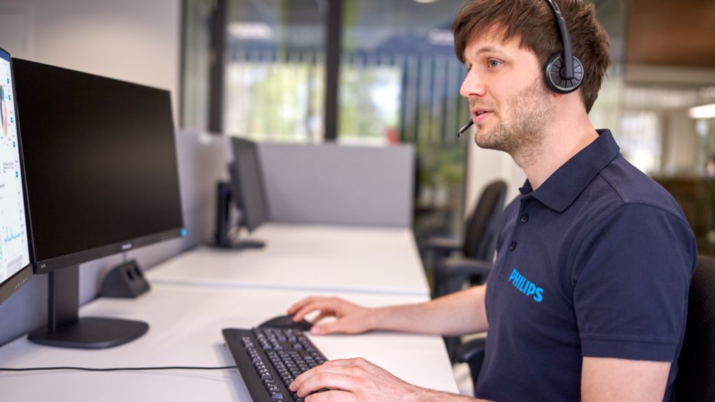 A male engineer working at computer