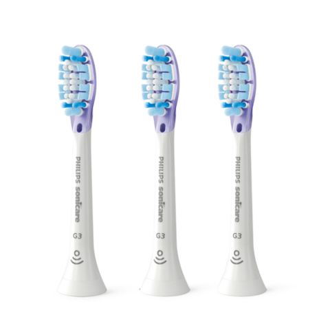 Three Philips Sonicare Premium Gum Care brush heads
