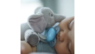 Plush toy helps keep ultra soft pacifier in place