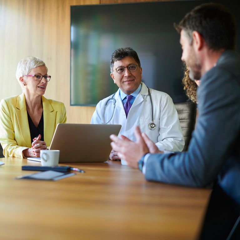 Hospital administrators meet to discuss financing models such as healthcare-as-a-service