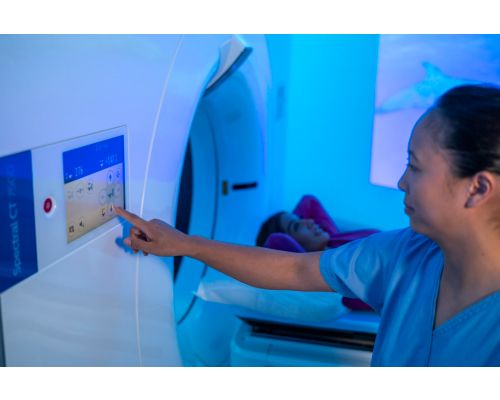 Patient in spectral ct scanner with ambient lighting