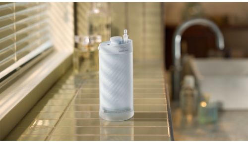 Komora 2 w 1 do przechowywania nasadek i otwór do napełniania