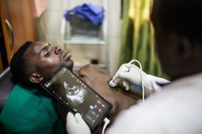 Lumify handheld ultrasound device in use for medical examination