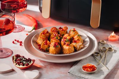 Salmon bites with honey pomegranate glaze on plate