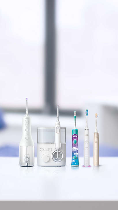Philips Oral Healthcare solutions arranged on a countertop