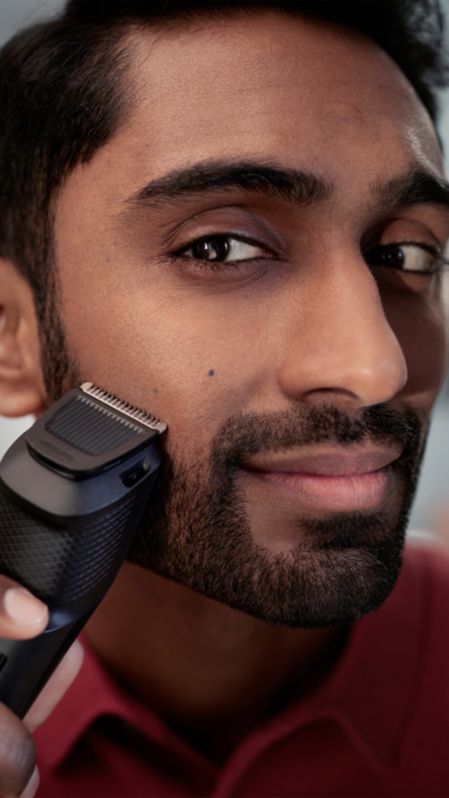 Man shaving his beard