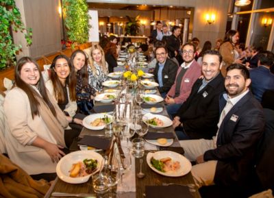 Radiology professionals gathered around dinner table at Philips Chile SOCHRADI event