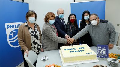 Philips Foundation and SESOBEL representatives celebrating healthcare equipment donation in Lebanon