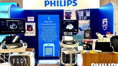 Philips booth showcasing cardiology solutions and ultrasound systems at medical congress