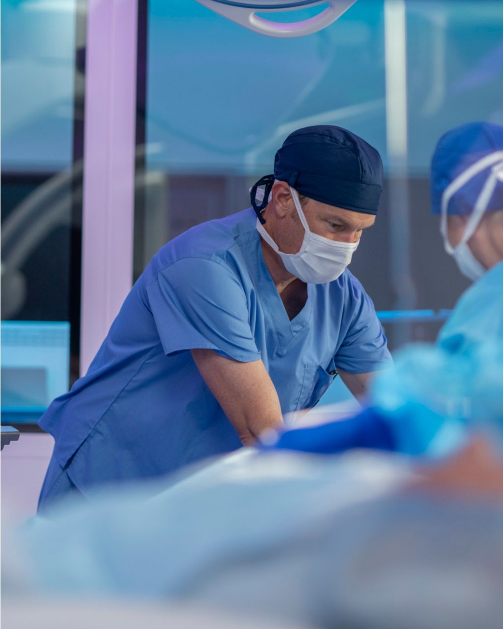 Image of physicians during a procedure 