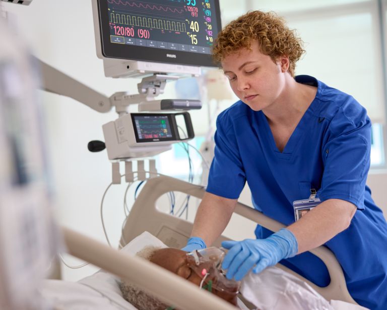 nurse caring for patient