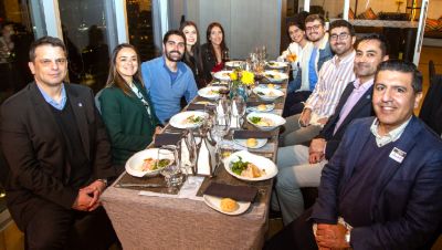 Radiology professionals seated at dinner during Philips Chile SOCHRADI event
