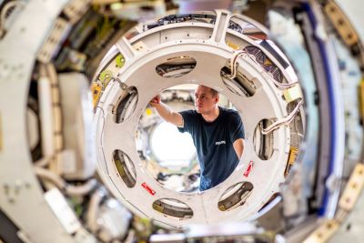 Technician refurbishing a MR imaging machine