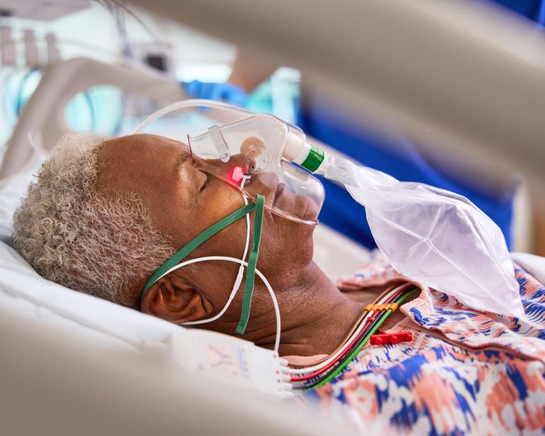 patient with Alar sensor, ECG lead set, and capnography bag