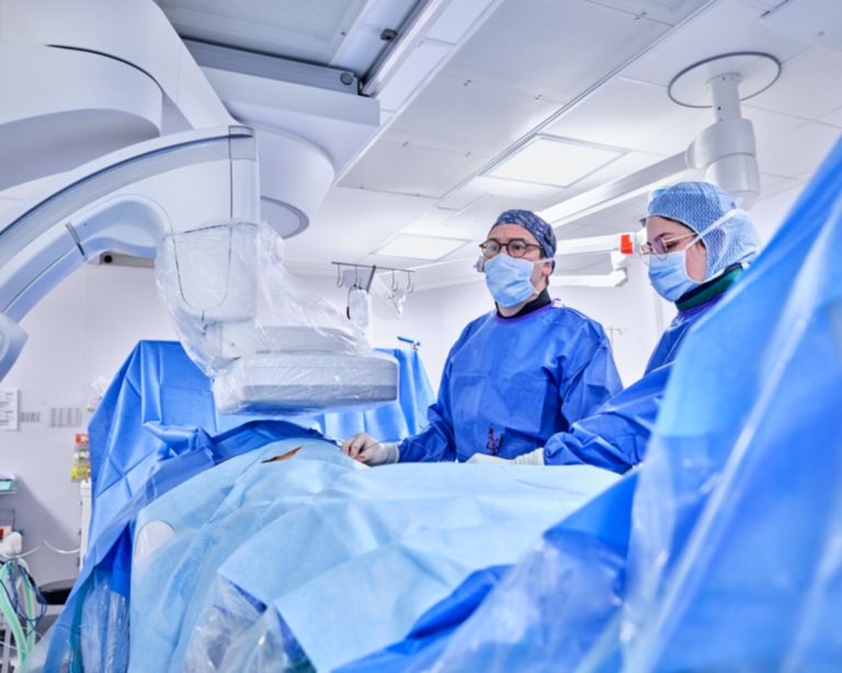 Surgeon operating FlexArm system in OR Regional hospital Mulhouse, France