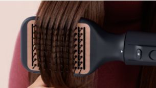 Paddle straightening brush for naturally straight look