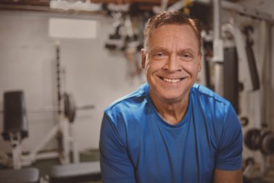 Patient smiling at the gym