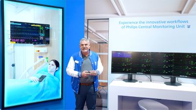 Nurse caring for male patient with MX850 and X3