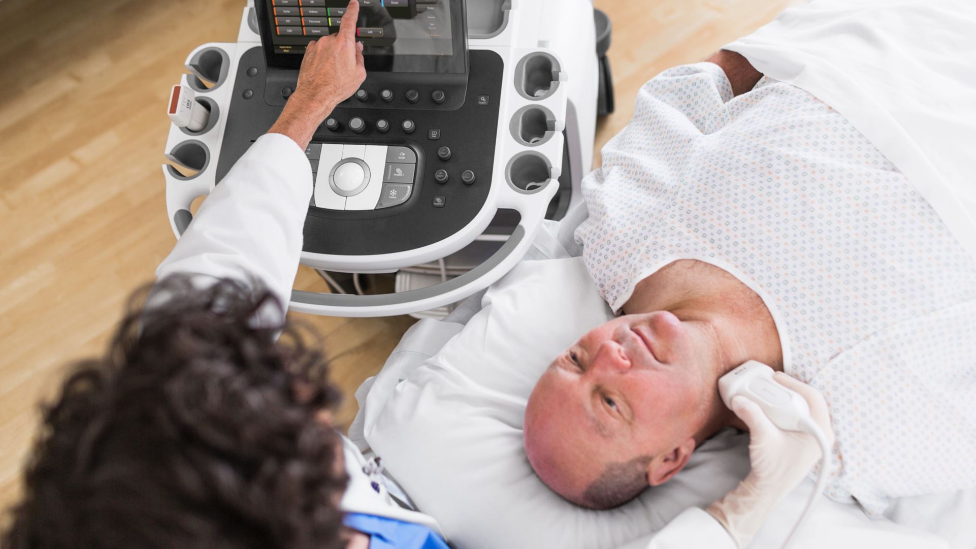 A clinician uses a preset to launch a workflow during an ultrasound exam.