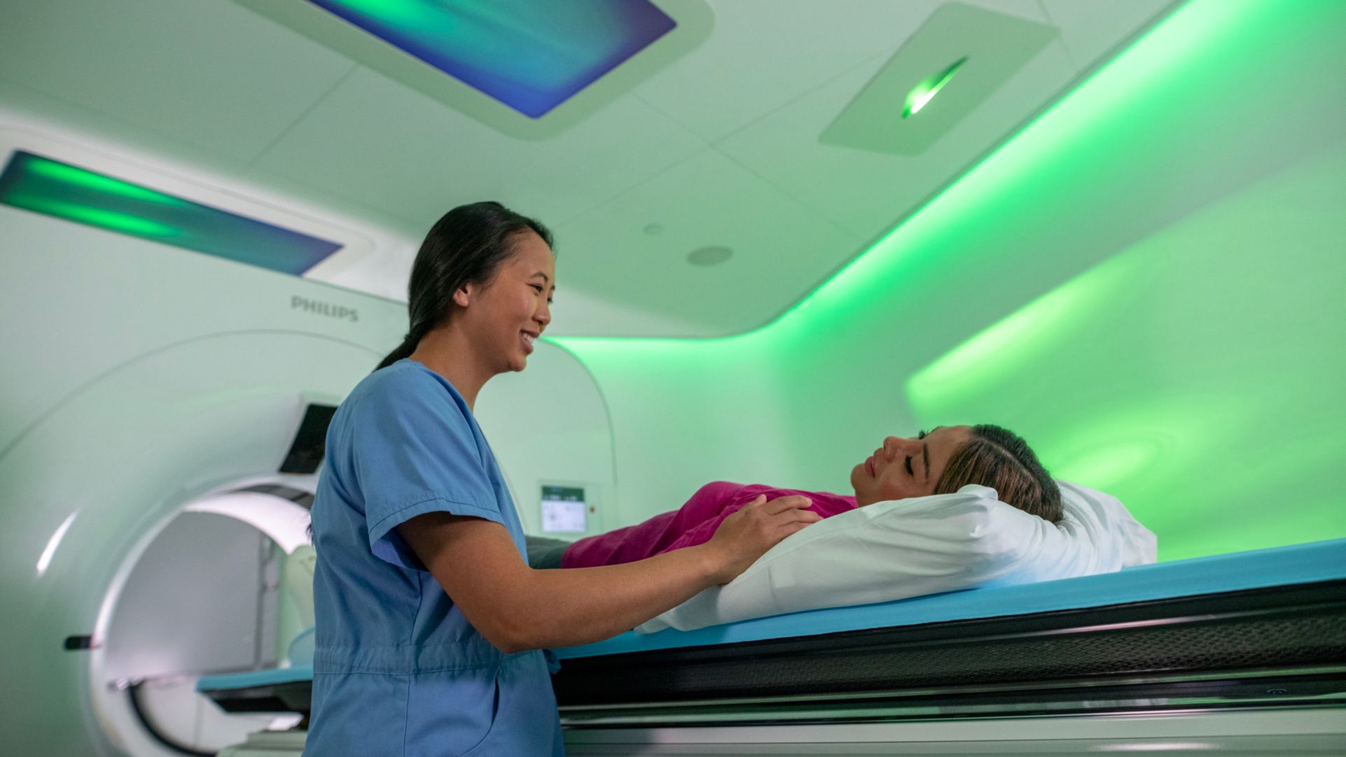 Patient in spectral ct scanner with ambient lighting 