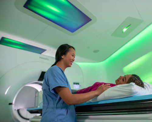 Patient in spectral ct scanner with ambient lighting