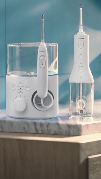 A countertop and Cordless Power Flosser on a counter.