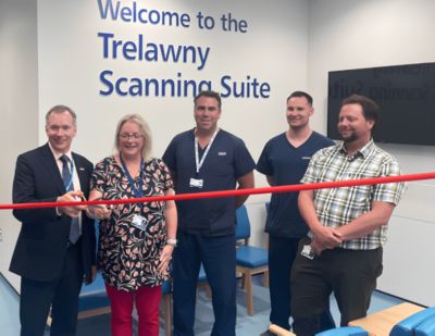 Staff at Royal Cornwall Hospital cutting the ribbon to open the new Trelawny Scanning Suite