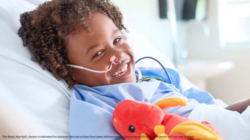 Child with nasal alar SpO₂ sensor