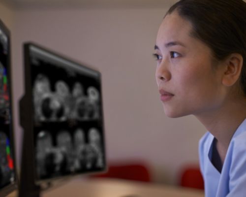 Radiologist watching images on screen