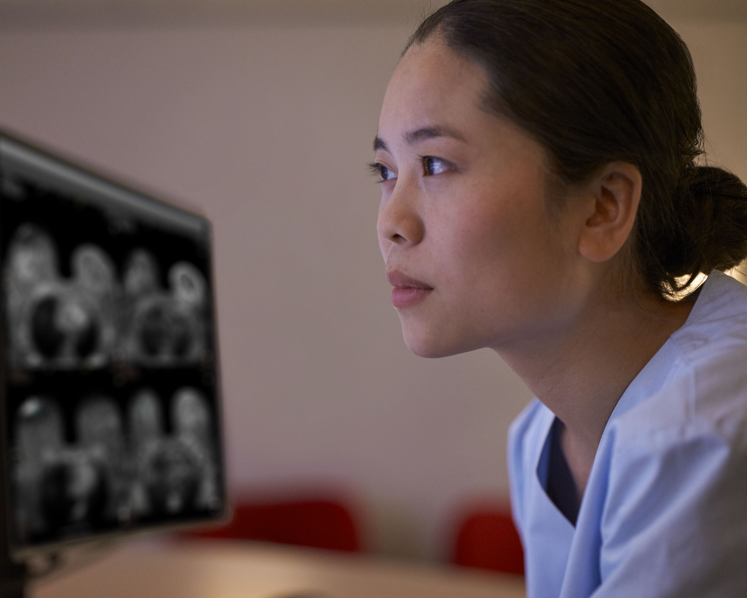 Radiologist watching images on screen