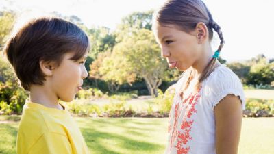children-making-faces-outdoors.jpg