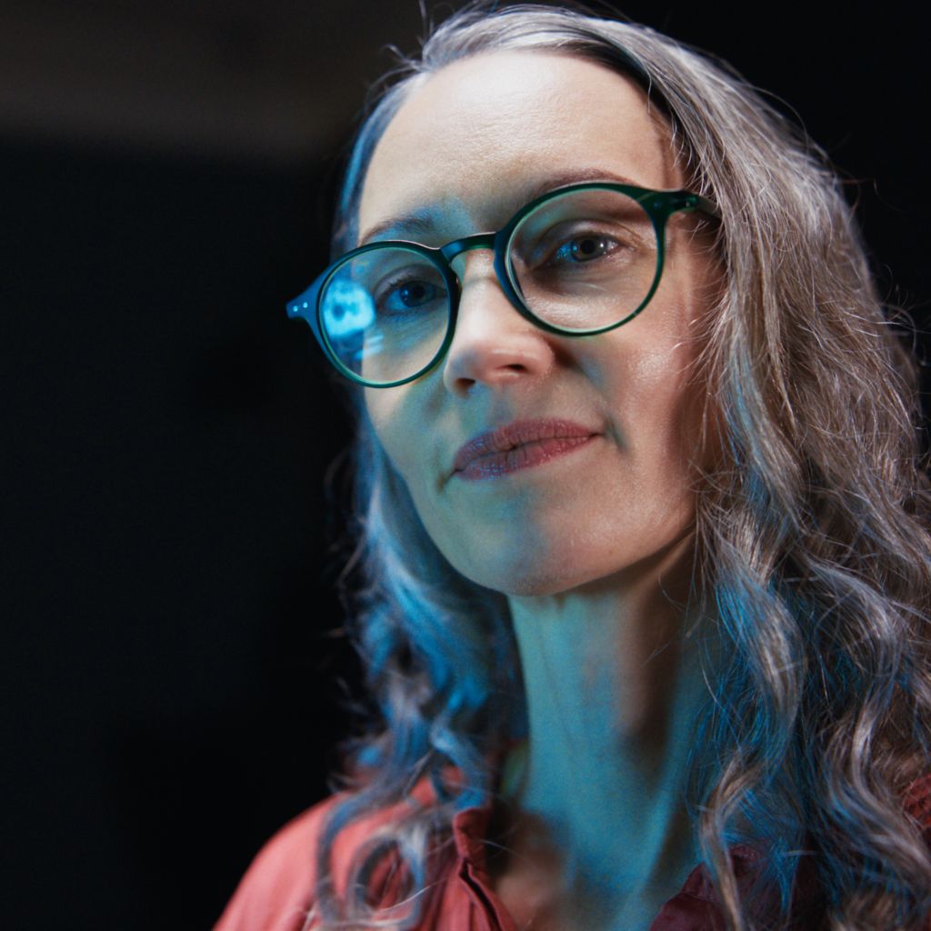 A woman looking to camera