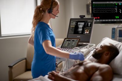 Clinician performing bedside cardiac ultrasound using Philips EPIQ system