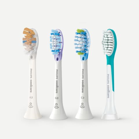 Sonicare brush heads aligned on a countertop