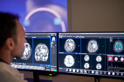 MRI console showing large high resolution images on two screens