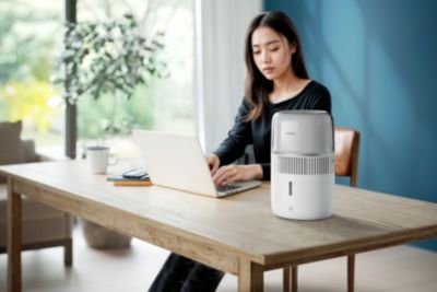 Philips Humidifier 5000 Series HU5710 on a desk in a home workspace