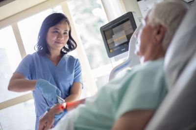 Nurse caring for patient in healthcare setting