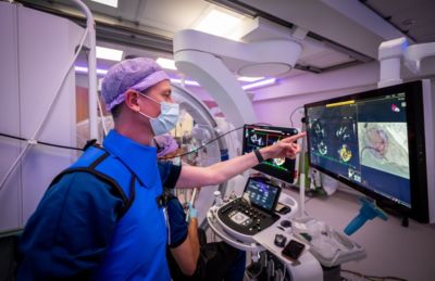 Clinician pointing at monitor