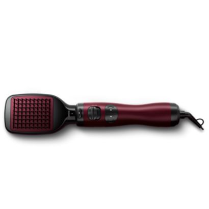 Style bouclé ou lisse avec le boucleur soufflant