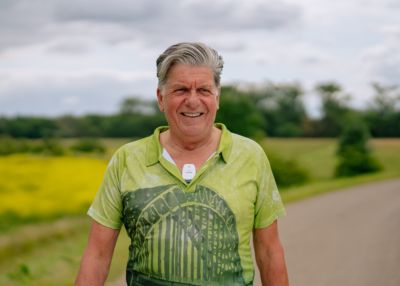 Close-up of research participant wearing Philips ePatch during walking study on atrial fibrillation
