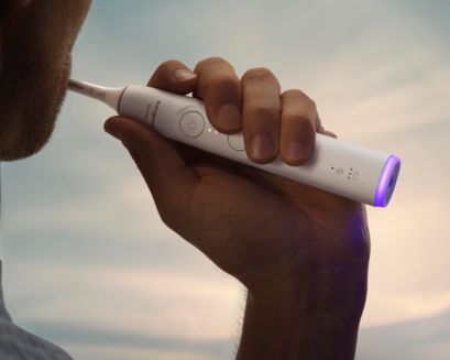 A patient brushing with a Philips Sonicare 6300