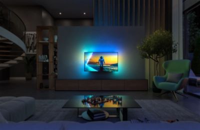 Philips Ambilight TV with immersive lighting in modern interior