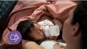 Dinappen frigör mjölk när bebisen dricker