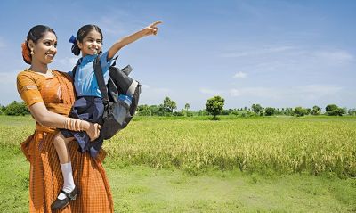 Mother with school-going daughter in rural India