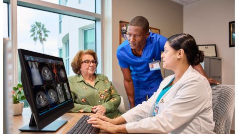 Radiologist looking at a screen