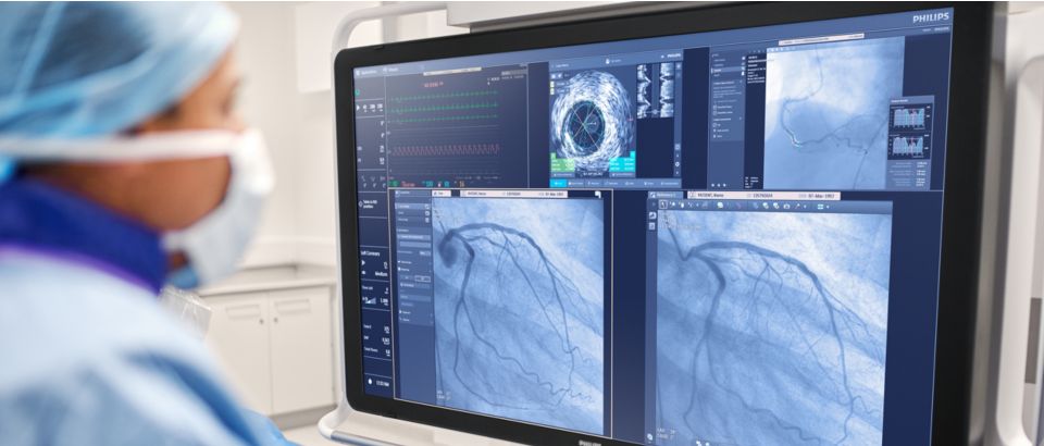A male physician conducting image guided therapy